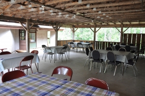 <b>Outdoor Dining</b><br />Outdoor covered dining area set up for COVID